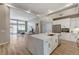 Bright kitchen with stainless steel appliances, a marble island, and open layout at 2714 Langlade Ave, Henderson, NV 89052