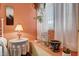 Sitting area with a table in bedroom with white curtains at 2725 S Nellis Blvd # 1038, Las Vegas, NV 89121