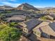 Aerial view of the backyard with covered patio, mountain view at 2771 Free Formed Ct, Las Vegas, NV 89138