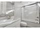 Beautiful bathroom features a shower and tub combination, designer mirror, and quartz counters at 2771 Free Formed Ct, Las Vegas, NV 89138