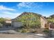 Street view of a single Gathering home with mature landscaping and desert scape at 2771 Free Formed Ct, Las Vegas, NV 89138