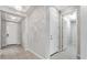 Hallway features modern lighting and leads to the front door and an adjacent room at 2771 Free Formed Ct, Las Vegas, NV 89138