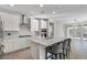 Bright, modern kitchen with a large island, stainless steel appliances, and ample cabinet space at 2771 Free Formed Ct, Las Vegas, NV 89138