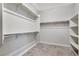Spacious walk-in closet with carpet and ample shelving for optimal storage and organization solutions at 2771 Free Formed Ct, Las Vegas, NV 89138