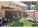 Backyard featuring a swing, seating, and garden features at 2830 Crystal Lantern Dr, Henderson, NV 89074