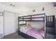 Well-organized bunkbed bedroom with carpeted floors at 2830 Crystal Lantern Dr, Henderson, NV 89074