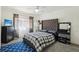 Bright bedroom with a ceiling fan, carpeted floor, and natural light at 2830 Crystal Lantern Dr, Henderson, NV 89074