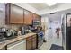 The kitchen features stainless steel appliances, ample counter space, and plenty of storage at 2830 Crystal Lantern Dr, Henderson, NV 89074
