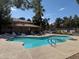 Resort style community pool and lounge area with a clubhouse at 2830 Crystal Lantern Dr, Henderson, NV 89074