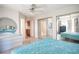 This bedroom features a large mirror, a dresser and an access to an attached bathroom at 2859 Palleta Dr, Henderson, NV 89074