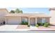 Inviting home with a tile roof, well-maintained landscaping, and an attached two-car garage enhancing curb appeal at 2859 Palleta Dr, Henderson, NV 89074
