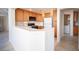 Cozy kitchen featuring wood cabinets and white countertops at 2859 Palleta Dr, Henderson, NV 89074