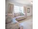 Comfortable living room with large windows allowing natural light at 2859 Palleta Dr, Henderson, NV 89074