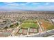 Extensive community view, featuring sports fields, grassy areas, and residential neighborhoods in the distance at 2896 Grande Arch St, Henderson, NV 89044