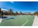 Community basketball court with a well-maintained surface, lighting, and scenic landscaping at 2896 Grande Arch St, Henderson, NV 89044