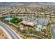Aerial view showcasing the community's pool, clubhouse, and lush landscaping, offering resort-style living at 2896 Grande Arch St, Henderson, NV 89044