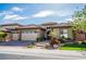 Charming home with well-manicured lawn and three-car garage at 2896 Grande Arch St, Henderson, NV 89044