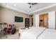 This bedroom features a drum set, modern decor, and natural light, offering space for entertainment and relaxation at 2896 Grande Arch St, Henderson, NV 89044