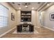 Bright office space featuring sleek built-ins, modern lighting, and wood floors at 2896 Grande Arch St, Henderson, NV 89044