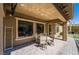 Covered patio with lots of natural light and outdoor seating area at 2896 Grande Arch St, Henderson, NV 89044