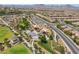 Community playground with shaded picnic areas and walking paths creating an inviting space for families to enjoy at 2896 Grande Arch St, Henderson, NV 89044