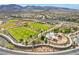 Neighborhood recreation area featuring sports fields, a playground, and walking paths in a picturesque setting at 2896 Grande Arch St, Henderson, NV 89044