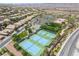 Aerial shot of the community tennis courts and amenities, perfect for active residents looking for recreation at 2896 Grande Arch St, Henderson, NV 89044
