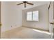 Neutral bedroom with a ceiling fan and natural light creates a calming space for rest and relaxation at 2904 Channel Bay Dr, Las Vegas, NV 89128