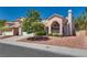 Charming single-Gathering home featuring a tile roof, landscaped yard, and stucco exterior at 2904 Channel Bay Dr, Las Vegas, NV 89128