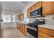 Kitchen with gas range and view to breakfast nook at 2904 Channel Bay Dr, Las Vegas, NV 89128
