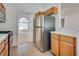 Bright kitchen with stainless steel fridge at 2904 Channel Bay Dr, Las Vegas, NV 89128