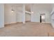 Bright living room boasts high ceilings, natural light, and an open layout perfect for modern living at 2904 Channel Bay Dr, Las Vegas, NV 89128