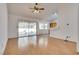 Living area with sliding doors to the outdoor patio and view of the kitchen at 2904 Channel Bay Dr, Las Vegas, NV 89128