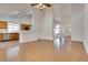 Bright, open living area with vaulted ceilings and views into kitchen at 2904 Channel Bay Dr, Las Vegas, NV 89128