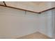 Empty walk-in closet space with clothing rods and a wire shelf for optimal storage at 2904 Channel Bay Dr, Las Vegas, NV 89128