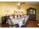 Dining room features a formal dining table and fireplace, perfect for entertaining guests at 3436 N Tenaya Way, Las Vegas, NV 89129