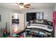 Well-equipped exercise room with a treadmill and ample space for a home gym setup at 3436 N Tenaya Way, Las Vegas, NV 89129
