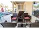Patio area with lounge chairs and covered space, creating a relaxing outdoor space at 3436 N Tenaya Way, Las Vegas, NV 89129