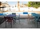 Backyard pool area with outdoor seating, perfect for summer relaxation and entertaining at 3436 N Tenaya Way, Las Vegas, NV 89129