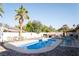 A backyard pool and patio area with a desert landscape perfect for outdoor living at 3436 N Tenaya Way, Las Vegas, NV 89129