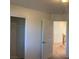 Bedroom features a closet and hallway, ready for its new owners to move in at 3728 Prairie Orchid Ave, North Las Vegas, NV 89081