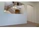 Hallway with view of stairs and dining room chandelier at 3728 Prairie Orchid Ave, North Las Vegas, NV 89081