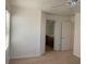 Spacious main bedroom with ceiling fan and view of the ensuite bathroom at 3728 Prairie Orchid Ave, North Las Vegas, NV 89081