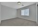 Bedroom with neutral carpet, window with blinds, and neutral paint at 3728 White Lion Ln, North Las Vegas, NV 89084