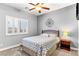 Serene bedroom with neutral walls, carpet, ceiling fan, and plantation shutters at 3811 Queen Elizabeth Ct, Laughlin, NV 89029