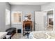 Bedroom featuring neutral colors, and a desk area with bright window at 3811 Queen Elizabeth Ct, Laughlin, NV 89029