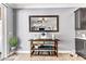 Inviting entryway with stylish console table, decorative mirror, and tiled flooring at 3811 Queen Elizabeth Ct, Laughlin, NV 89029