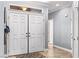 Entryway with double doors, transom window, and stylish tile flooring at 3811 Queen Elizabeth Ct, Laughlin, NV 89029