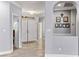 Entryway with tile floors, a view of the front doors, and an arched opening at 3811 Queen Elizabeth Ct, Laughlin, NV 89029
