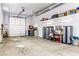 Versatile garage space with storage shelving, a workbench, and plenty of open area at 3811 Queen Elizabeth Ct, Laughlin, NV 89029